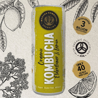 A can of Moocha Kombucha Sparkling Organic Kombucha in Elderflower & Lemon flavor stands against a backdrop of black and white botanical illustrations. The label highlights added 3 billion live cultures, IOA certification, and 40 calories per can. The drink is vegan and gluten-free.